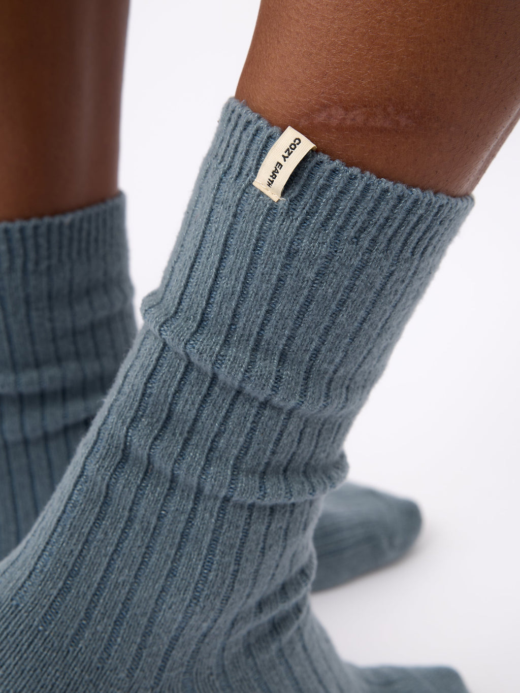 Close-up of tag on Cozy Earth Plush Lounge Calf Sock in Deep Blue |Color:Eclipse/Deep Blue/Smokey Blue