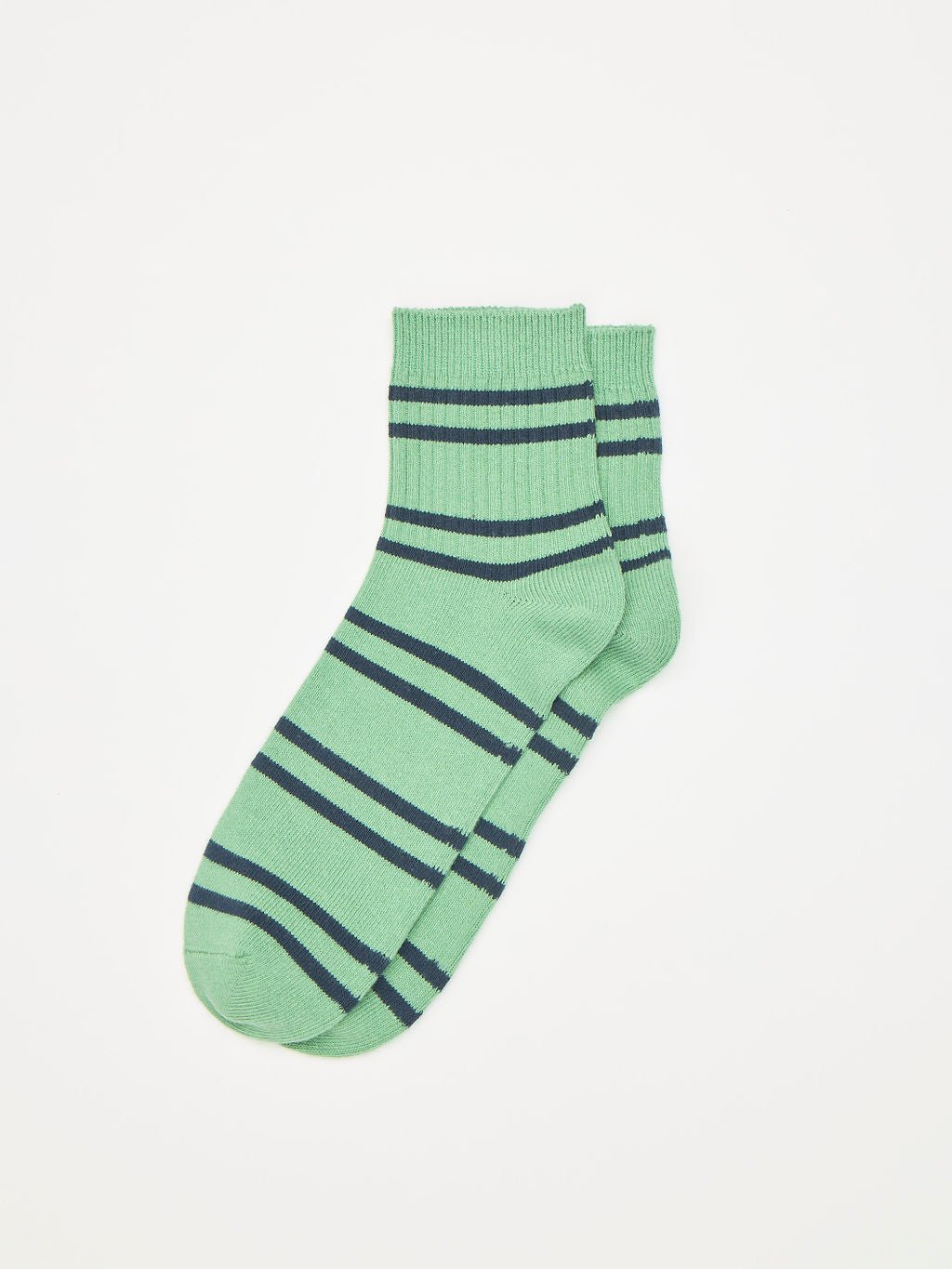 The Women's Sadie Sock by Cozy Earth features dark blue horizontal stripes on green, displayed against a plain white background. These socks have ribbed cuffs and a simple, casual design. |Color:Wintergreen/Eclipse