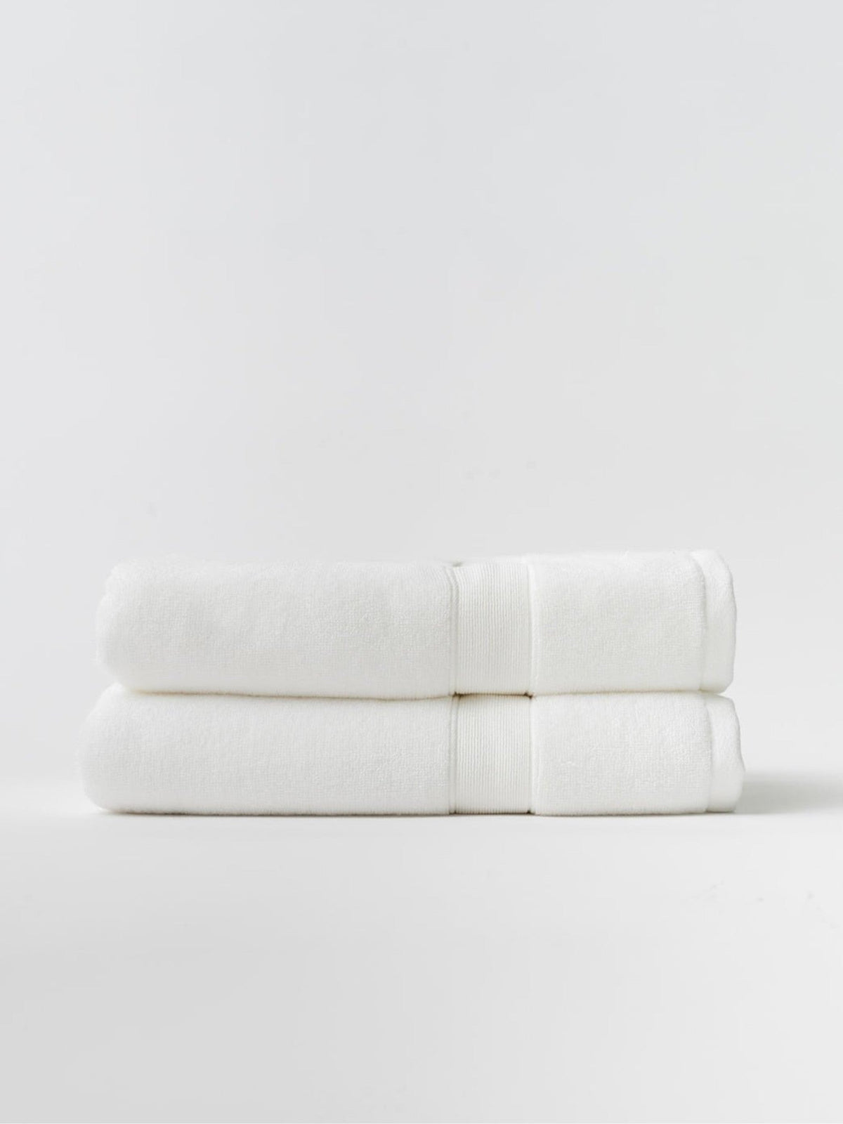 White luxe bath towels folded with white background |Color:White