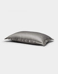 A single Cozy Earth Bamboo Quilted Sham in gray with a subtle star pattern is displayed on a plain white background.|Color:Charcoal