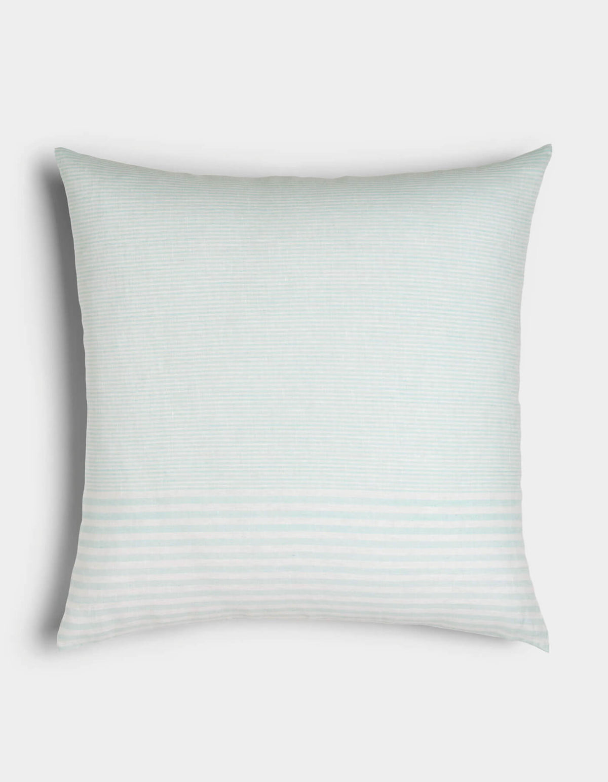 The Cozy Earth Striped Throw Pillow features a rectangular, light blue design with subtle horizontal stripes—thicker at the lower part—set against a plain white background.|Color:Mixed Stripe Tide and Sea Salt |Size:26" x 26"