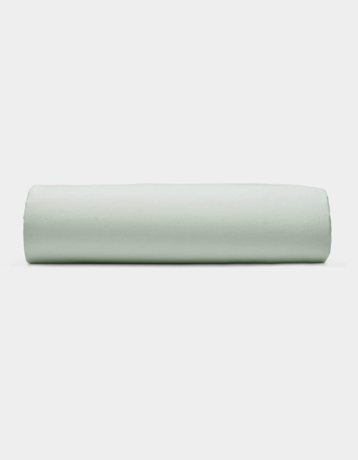 A Soft-Wash Cotton Fitted Sheet by Cozy Earth is displayed neatly folded against a plain white background.|Color:Laurel