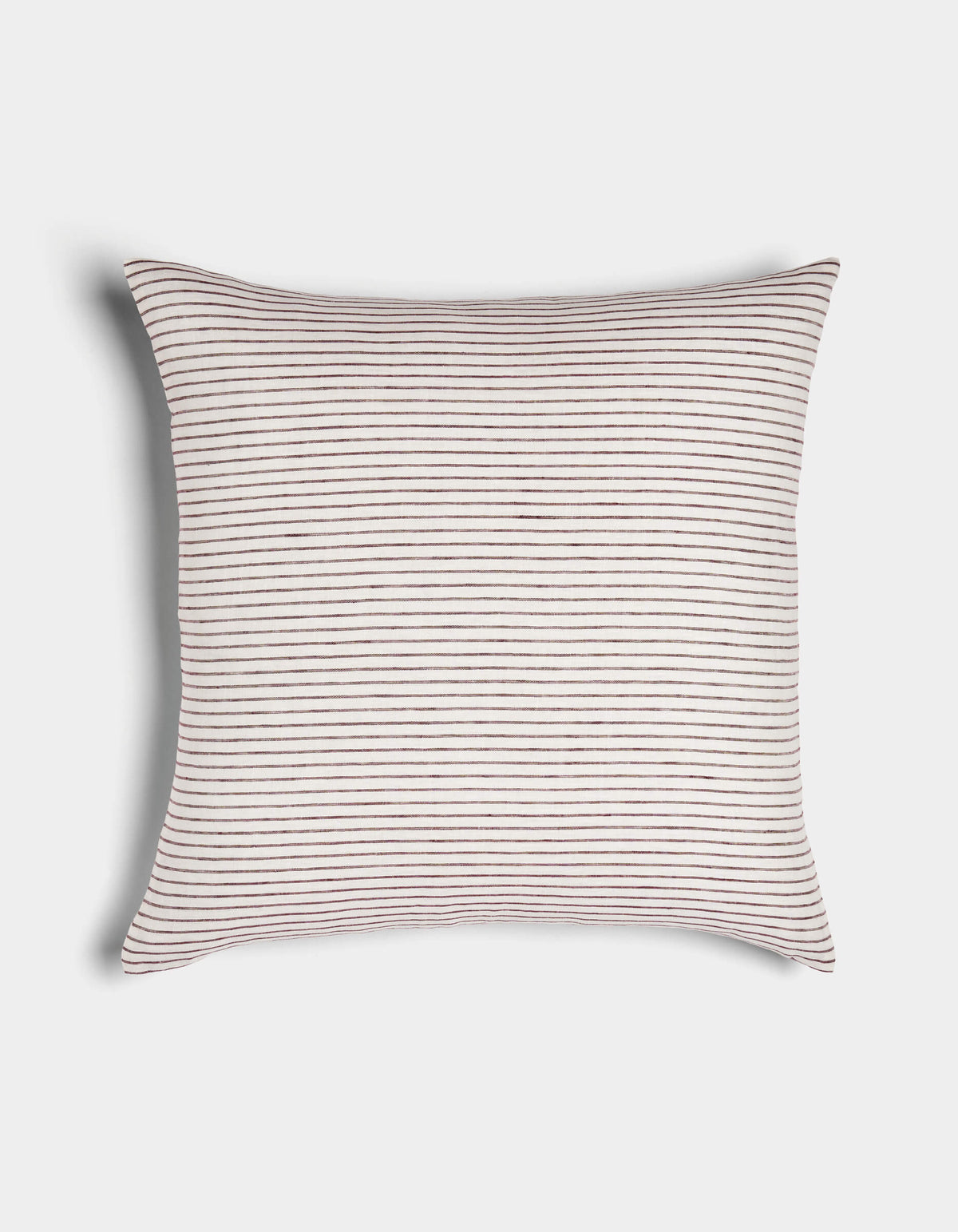 The Cozy Earth Striped Throw Pillow features a soft white fabric with thin, evenly spaced horizontal brown stripes and gently curved edges, displayed on a plain white surface.|Color:Narrow Stripe Currant and Sea Salt |Size:24" x 24"
