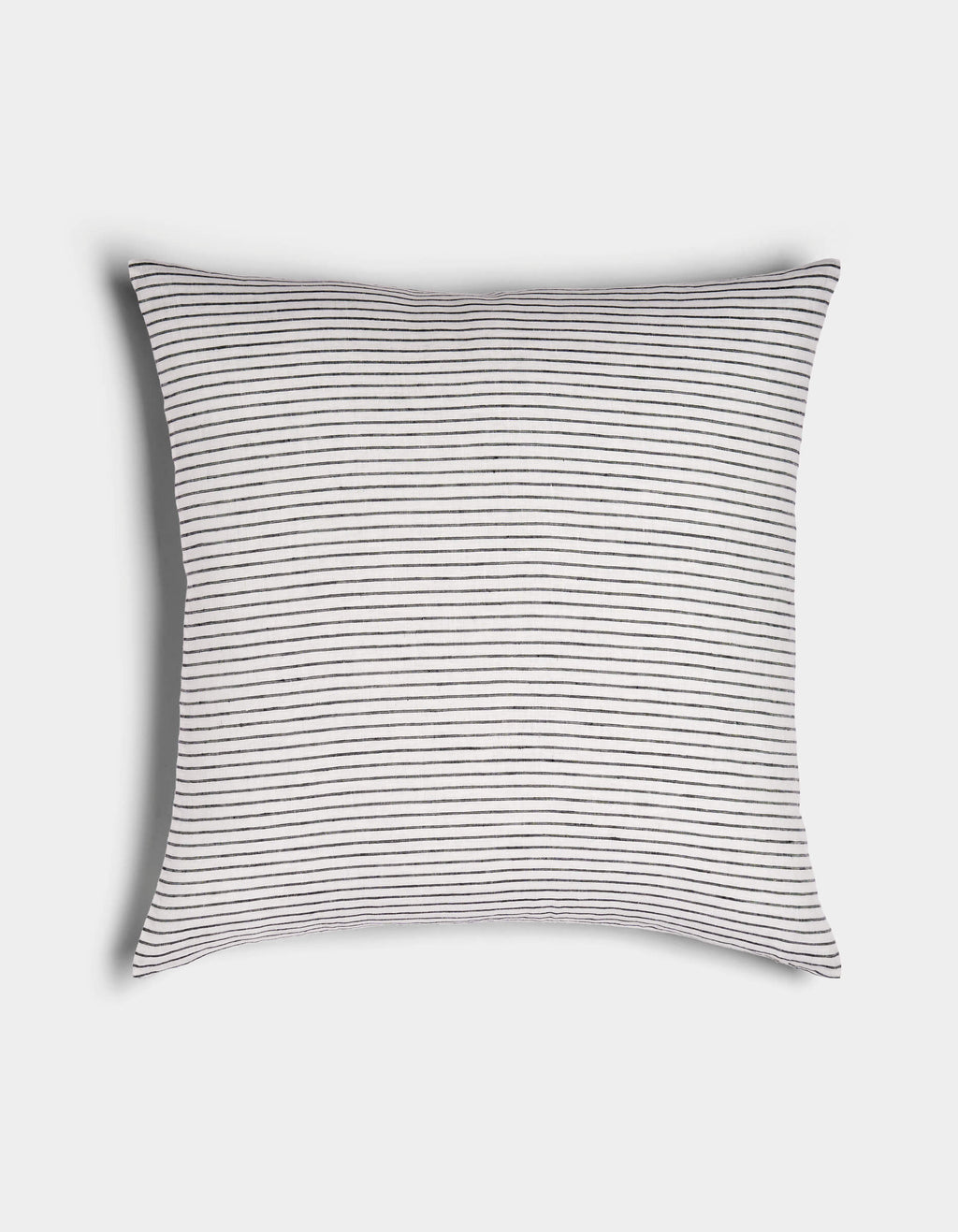 The Striped Throw Pillow by Cozy Earth features a white background with thin, evenly spaced black horizontal stripes, displayed on a plain white surface.|Color:Narrow Stripe Eclipse and Sea Salt |Size:24" x 24"