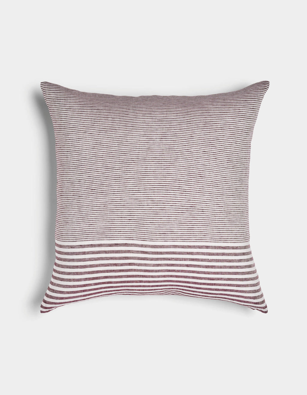 The Cozy Earth Striped Throw Pillow features a maroon and white striped design: thin horizontal stripes cover the top two-thirds, while wide stripes accent the bottom third, all on a plain white background.|Color:Mixed Stripe Currant and Sea Salt |Size:24" x 24"