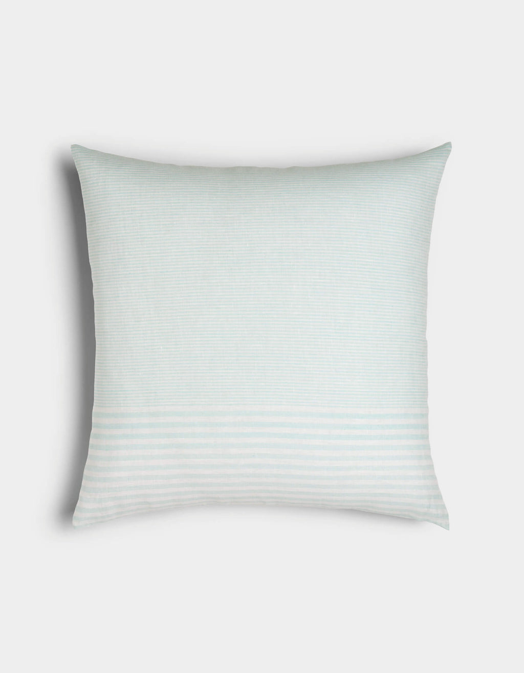 The Cozy Earth Striped Throw Pillow features light blue and white horizontal stripes and a rectangular shape, displayed on a plain white background.|Color:Mixed Stripe Tide and Sea Salt |Size:24" x 24"