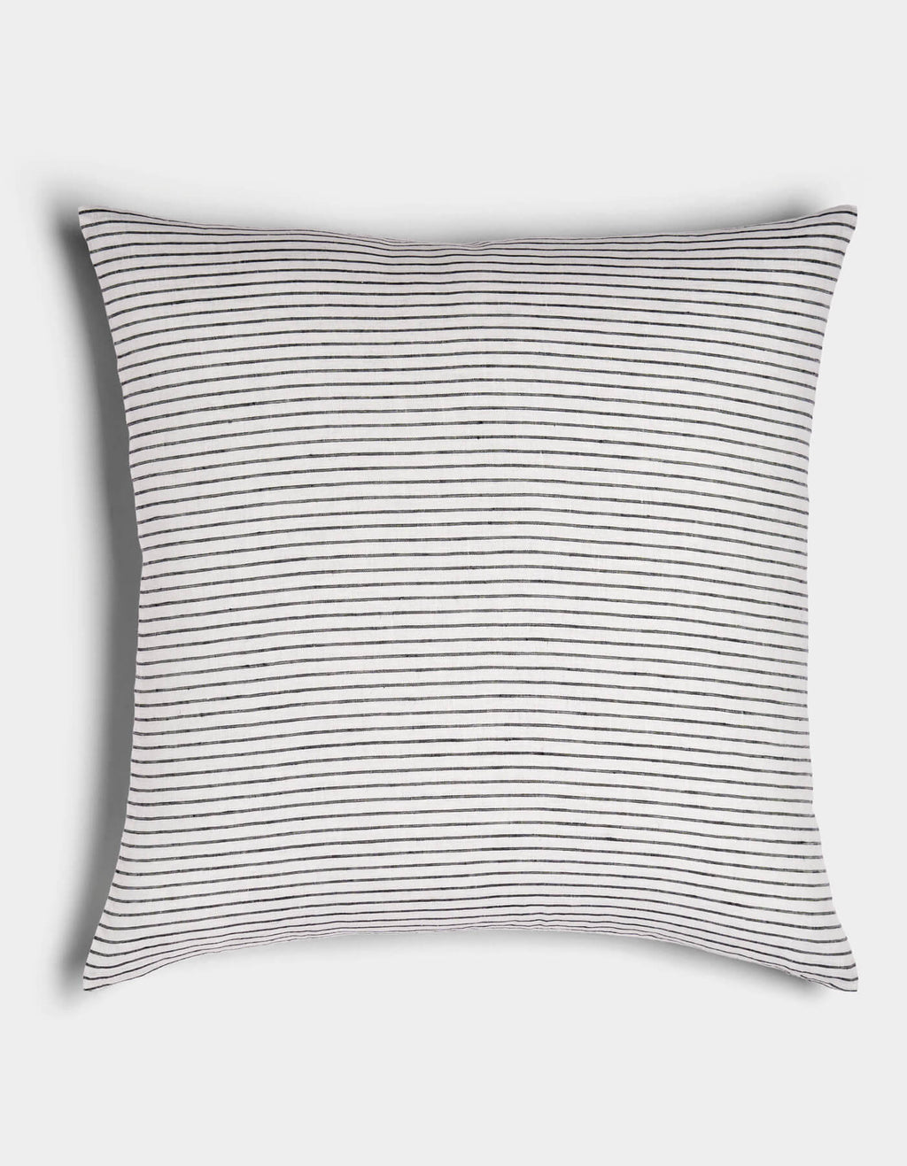 The Cozy Earth Striped Throw Pillow features a white background with thin, evenly spaced horizontal black stripes, displayed on a plain white surface.|Color:Narrow Stripe Eclipse and Sea Salt |Size:26" x 26"