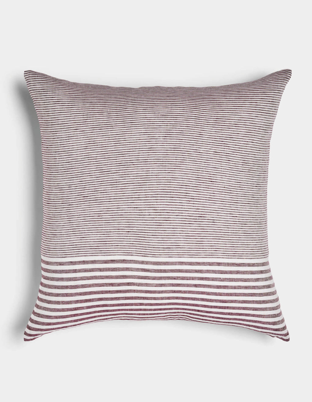 The Cozy Earth Striped Throw Pillow features thin burgundy and white horizontal stripes with a bold band of wider stripes at the bottom, displayed on a white background.|Color:Mixed Stripe Currant and Sea Salt |Size:26" x 26"