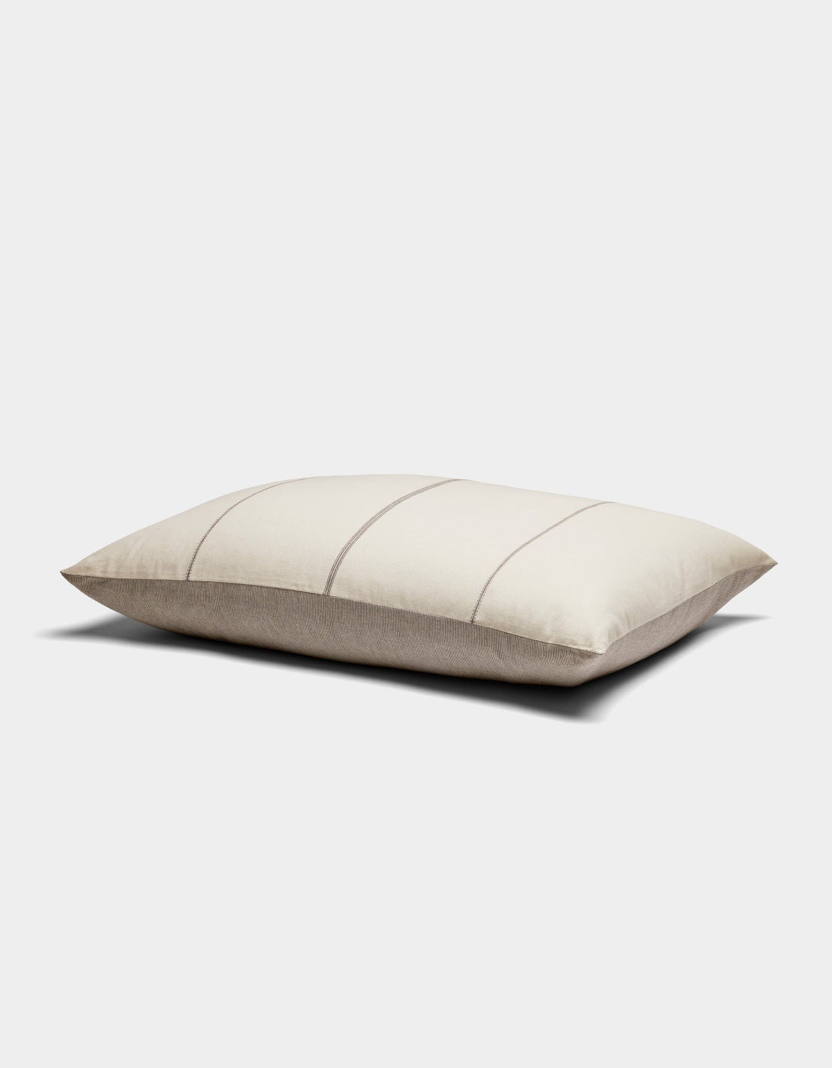 The Cozy Earth Baja Double Sided Sham is a rectangular beige pillow featuring thin, light gray horizontal stripes, shown on a white background.|Color:Coal Stripe/Striped Alabaster