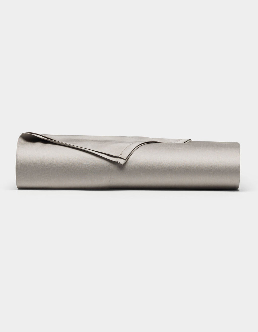 The Cozy Earth Bamboo Flat Sheet, in light gray, is neatly rolled and displayed on a plain white background.|Color:Dove Grey