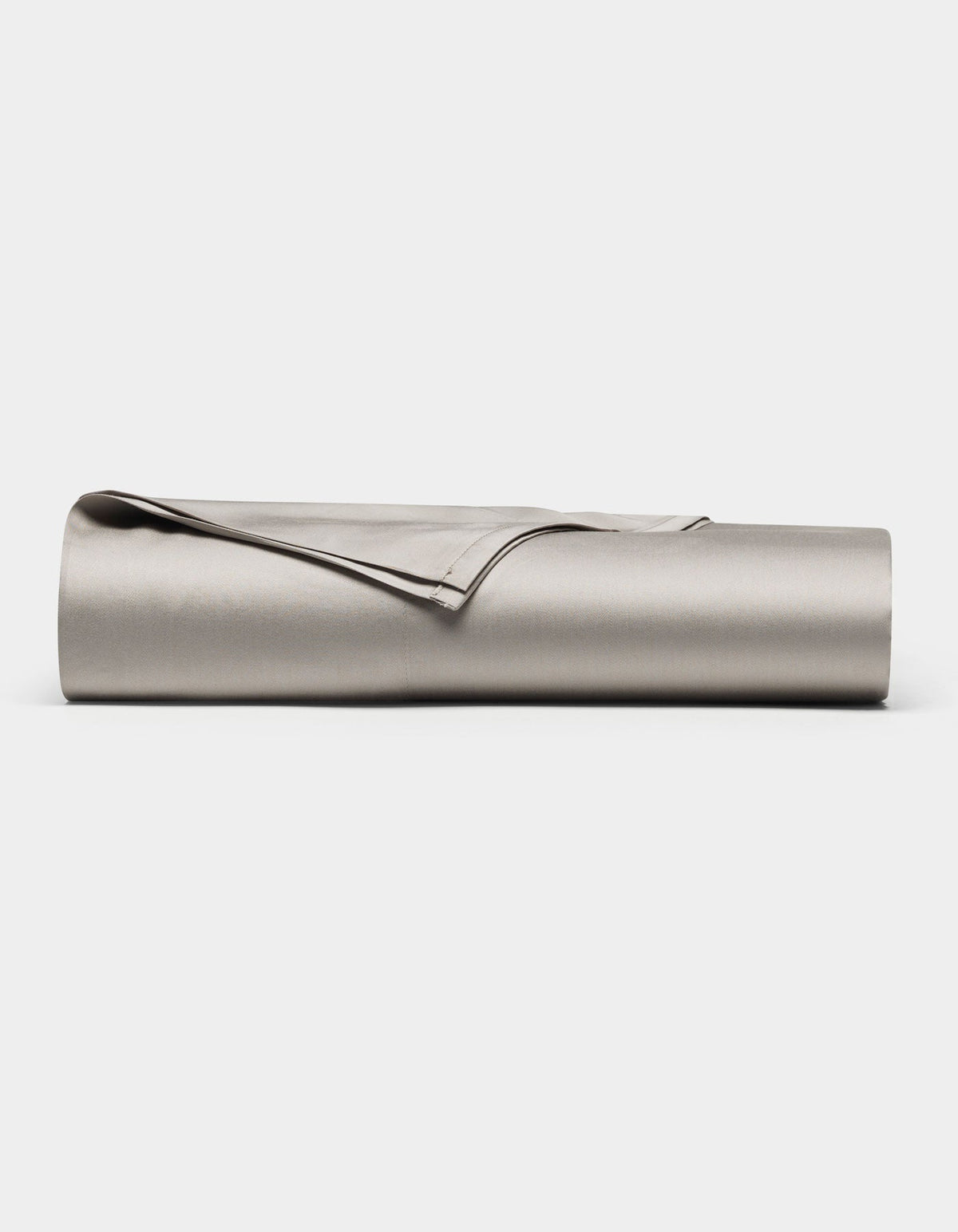 The Cozy Earth Bamboo Flat Sheet, in light gray, is neatly rolled and displayed on a plain white background.|Color:Dove Grey