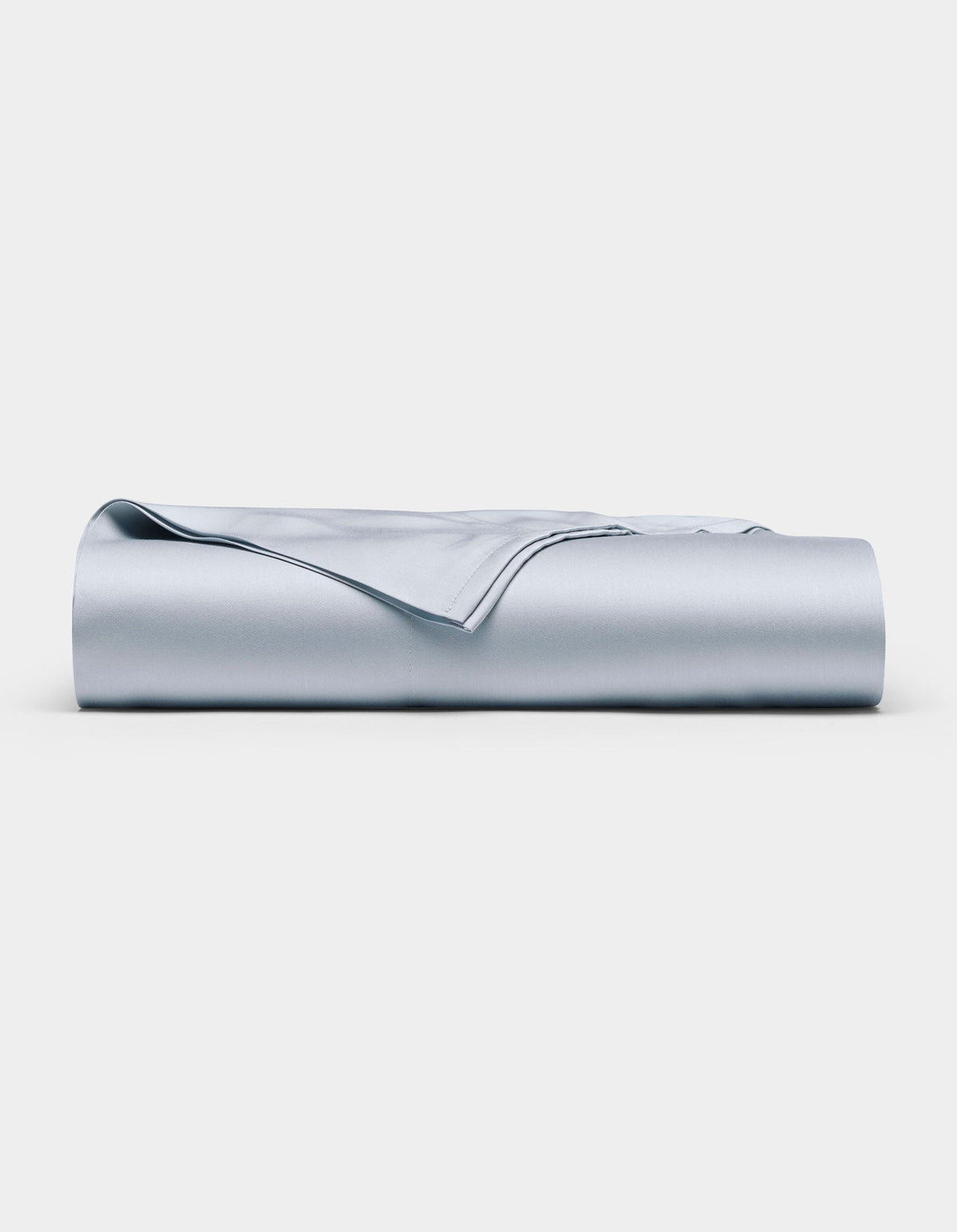 The Cozy Earth Bamboo Flat Sheet in light blue is neatly folded and displayed against a plain white background.|Color:Shore