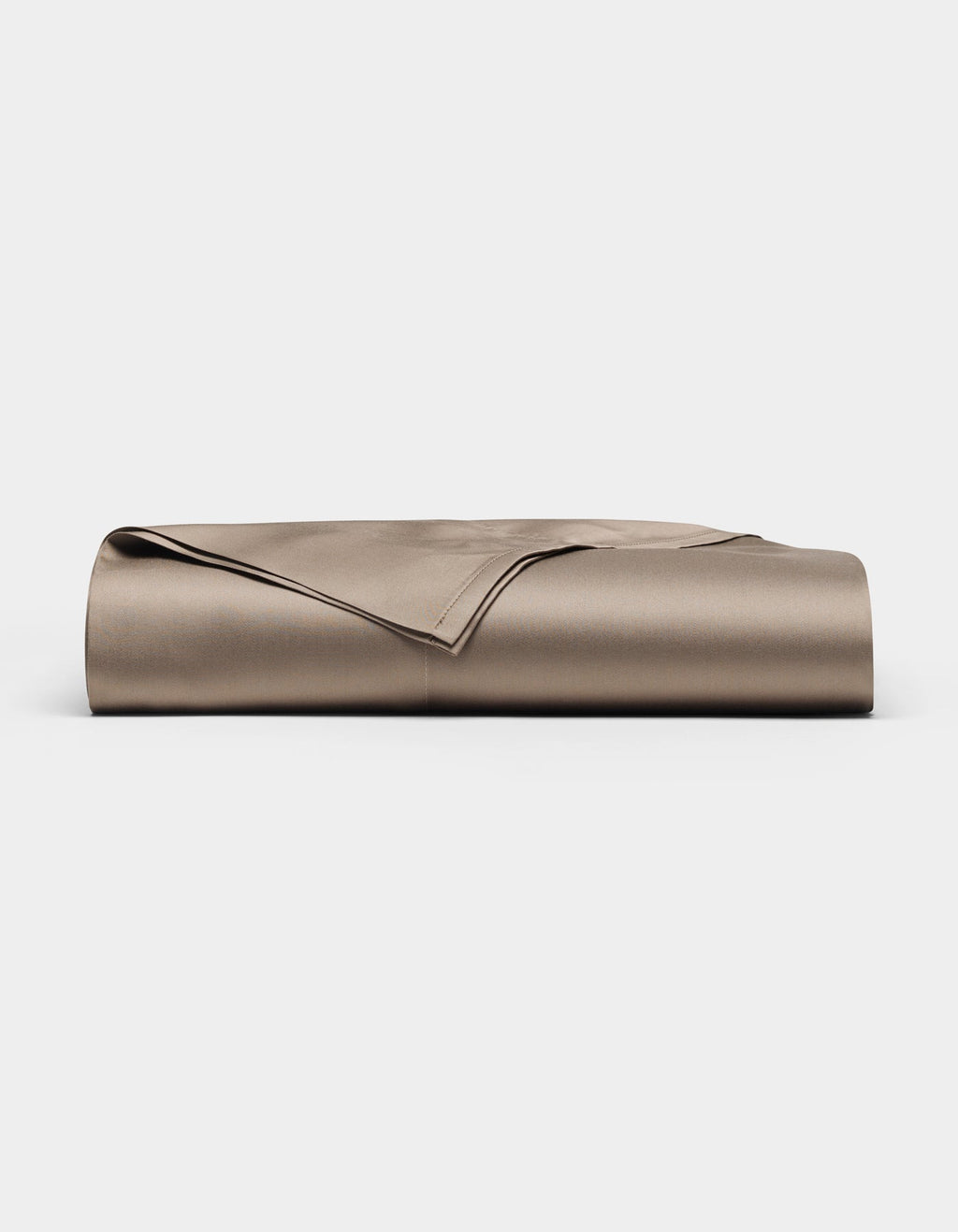A neatly folded Bamboo Flat Sheet by Cozy Earth in taupe is displayed on a plain white background.|Color:Walnut