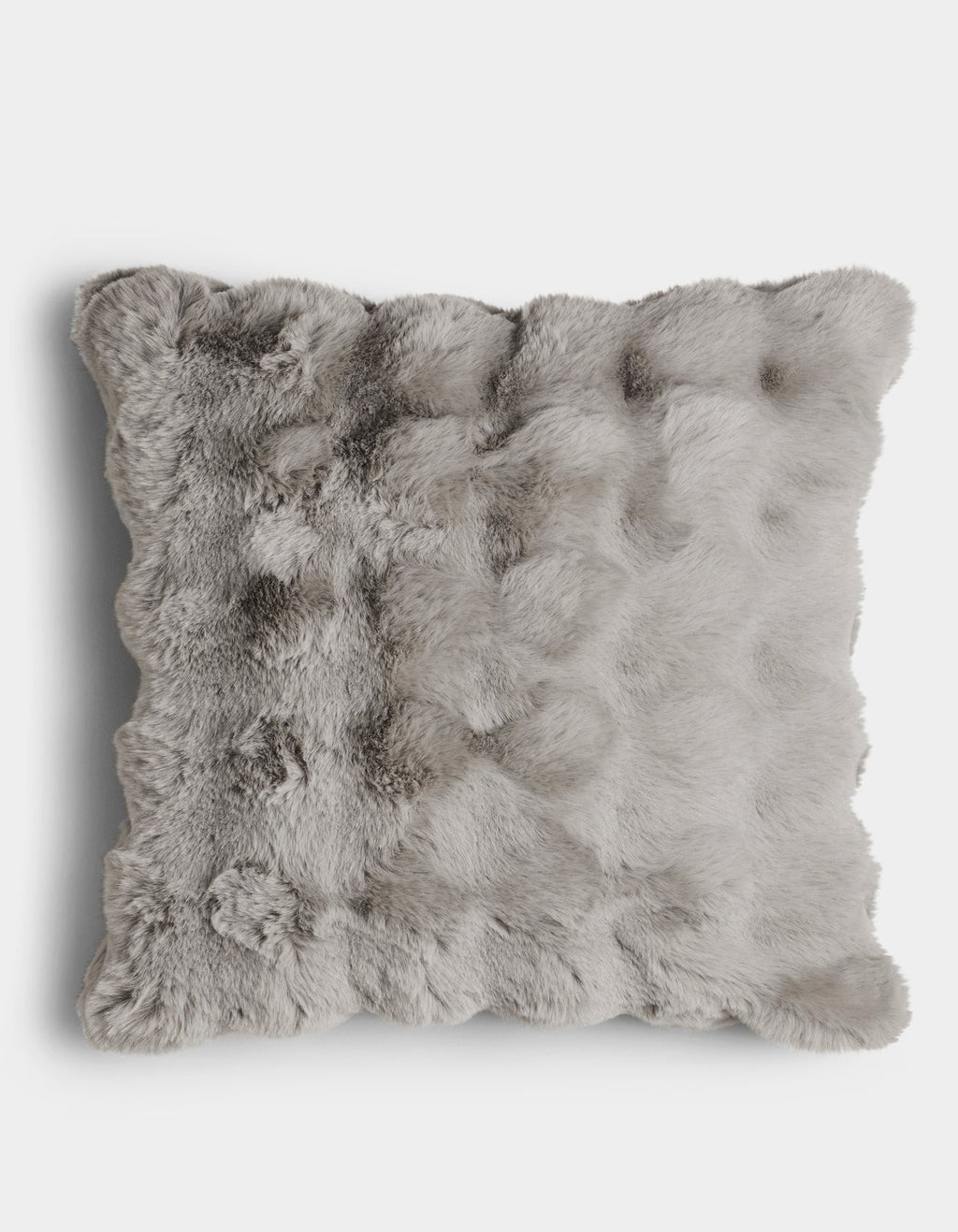 The Bubble Cuddle Pillow by Cozy Earth is a square, light gray faux fur cushion with a fluffy, textured surface, shown from above on a plain white background.|Color:Light Grey |Size:Euro