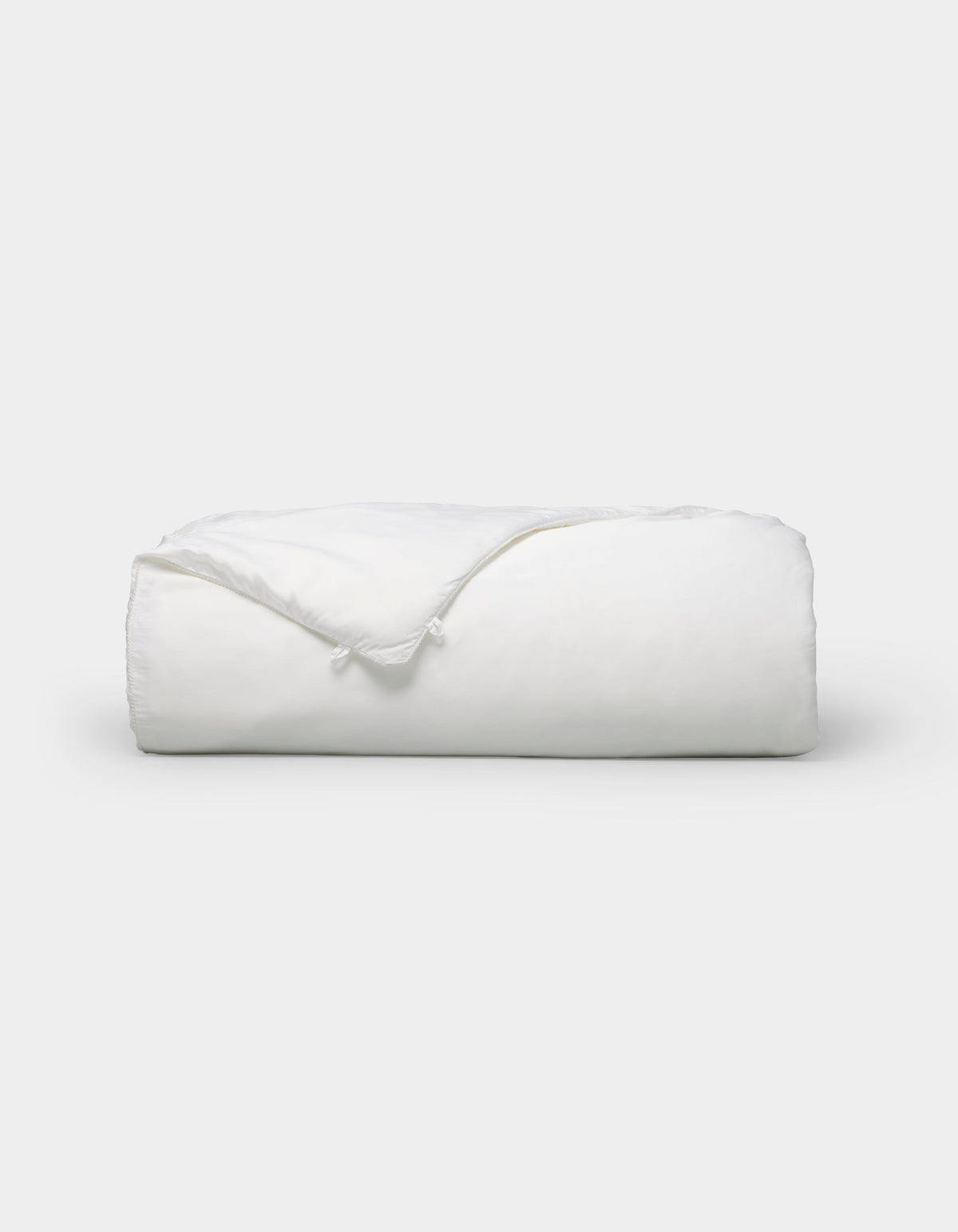 Silk comforter to be paired with Dove Grey, Charcoal, Creme, Driftwood, Flax, Light Grey, Oat, Pacific Blue, Shore, Walnut, Laurel, Peony, Classic Stripe in Pacific, Classic Stripe in Ebony, Classic Stripe in Laurel, Baja Stripe in Maple, Baja Stripe in Laurel, Mulberry, River, Classic Stripe in Dew, Lavender, Sonoma Floral in Vintage White, or White duvet cover.