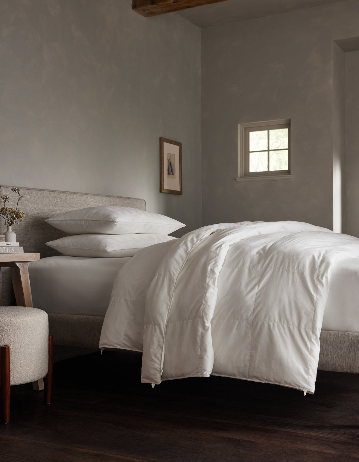 Down alternative comforter to be paired with Dove Grey, Charcoal, Creme, Driftwood, Light Grey, Oat, Pacific Blue, Shore, Peony, Walnut, Laurel, Classic Stripe in Pacific, Classic Stripe in Ebony, Classic Stripe in Laurel, White duvet cover.|Filling:Lightweight