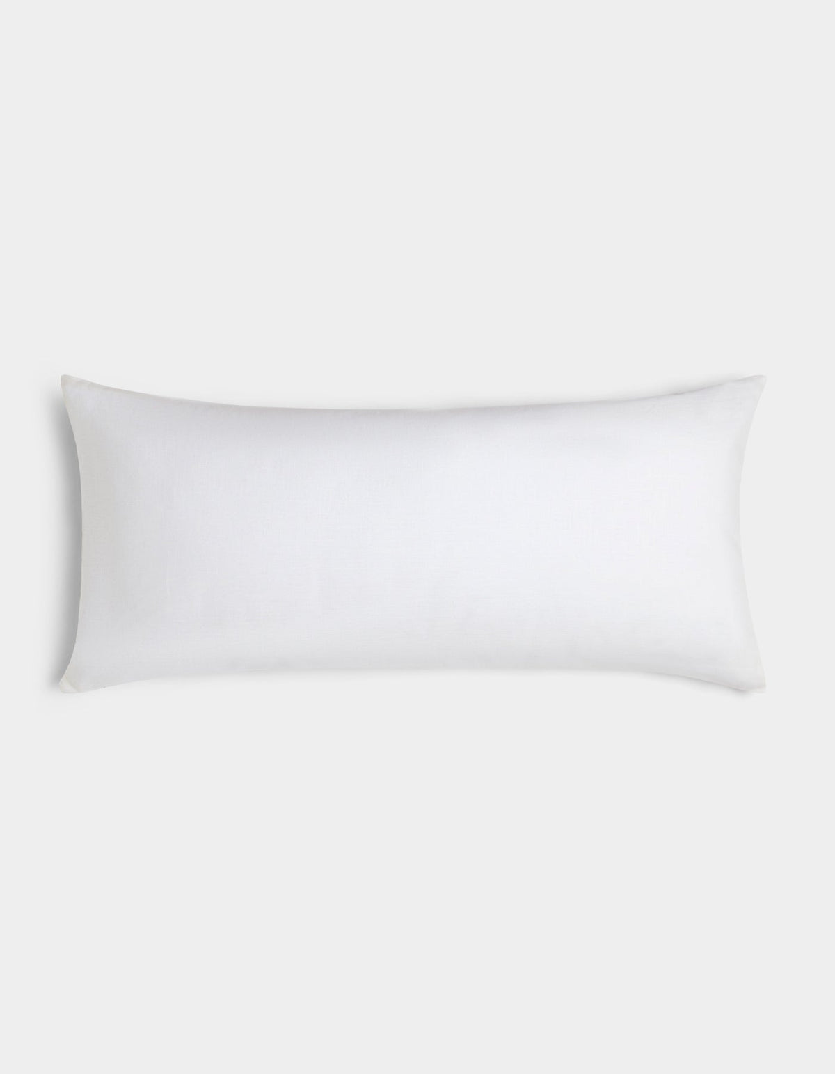 The Cozy Earth Linen Throw Pillow, featuring a simple white rectangular design, is displayed against a light gray background. |Color:White |Size:14" x 30"