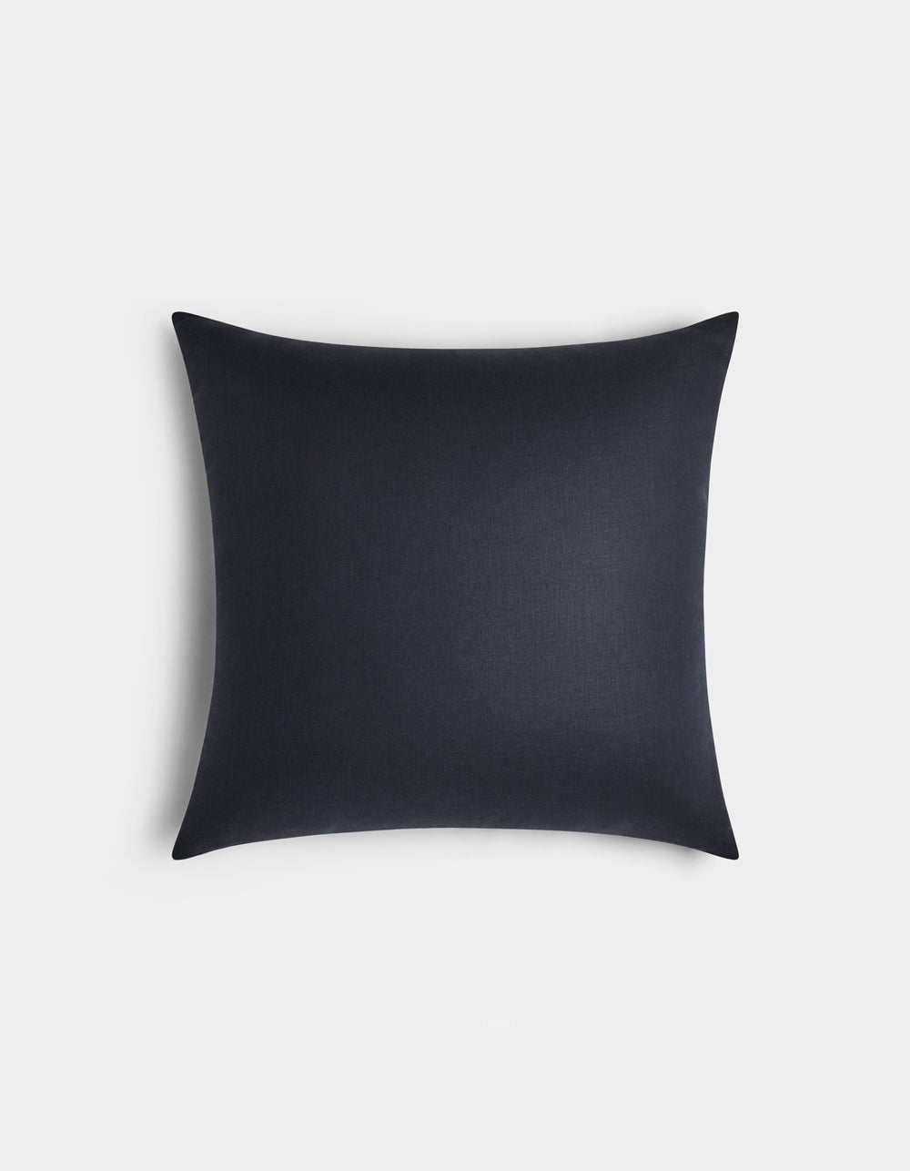 The Cozy Earth Linen Throw Pillow is square and dark navy blue with a smooth, plain fabric, displayed against a light gray background.|Color:Eclipse|Size:20" x 20"