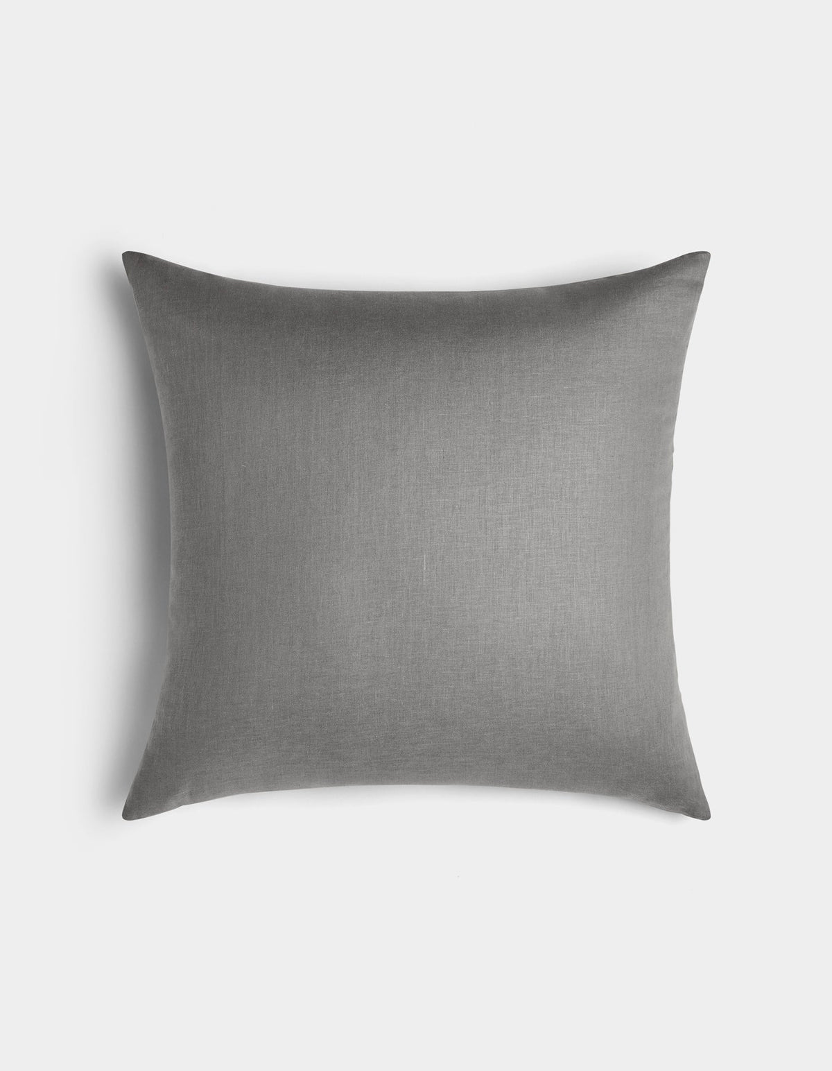 The Linen Throw Pillow by Cozy Earth is rectangular and gray, featuring a smooth, solid-colored fabric cover. It is displayed against a plain white background.|Color:Steel |Size:24" x 24"