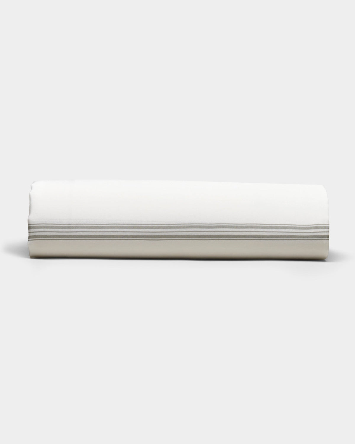 The Bamboo Sheet Set by Cozy Earth is shown neatly rolled, featuring subtle horizontal gray stripes near the edge, set against a plain light gray background.|Color:Baja Stripe in Laurel