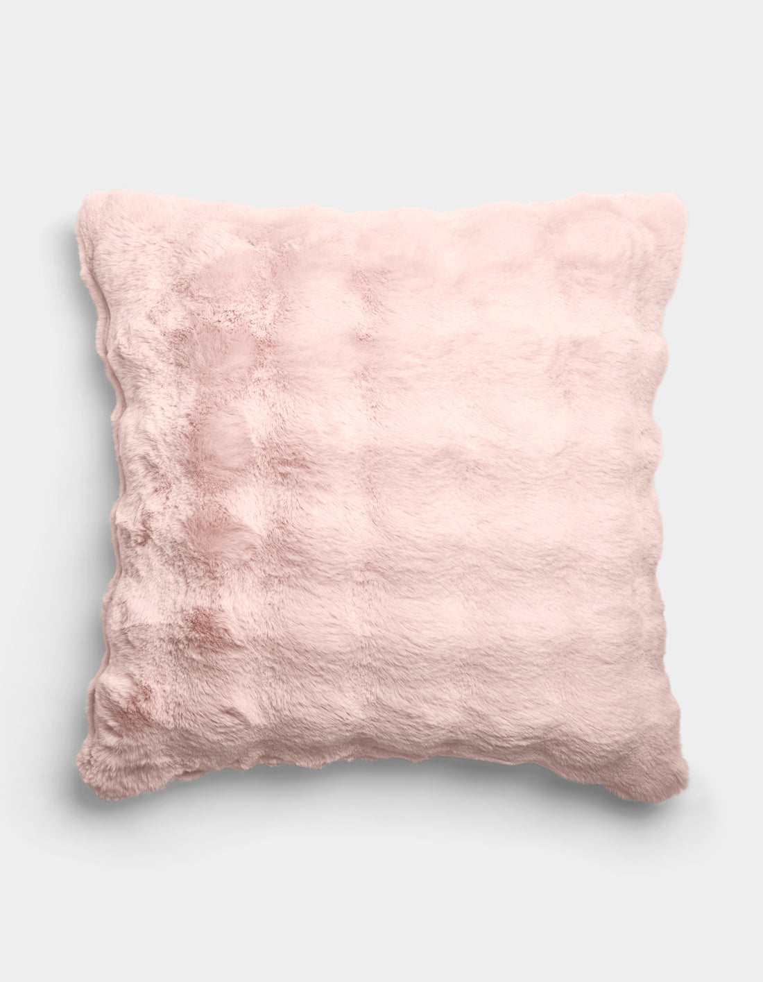 The Cozy Earth Bubble Cuddle Pillow, a square, light pink and fluffy cushion with a soft plush texture, is displayed against a plain white background.|Color:Blossom |Size:Euro