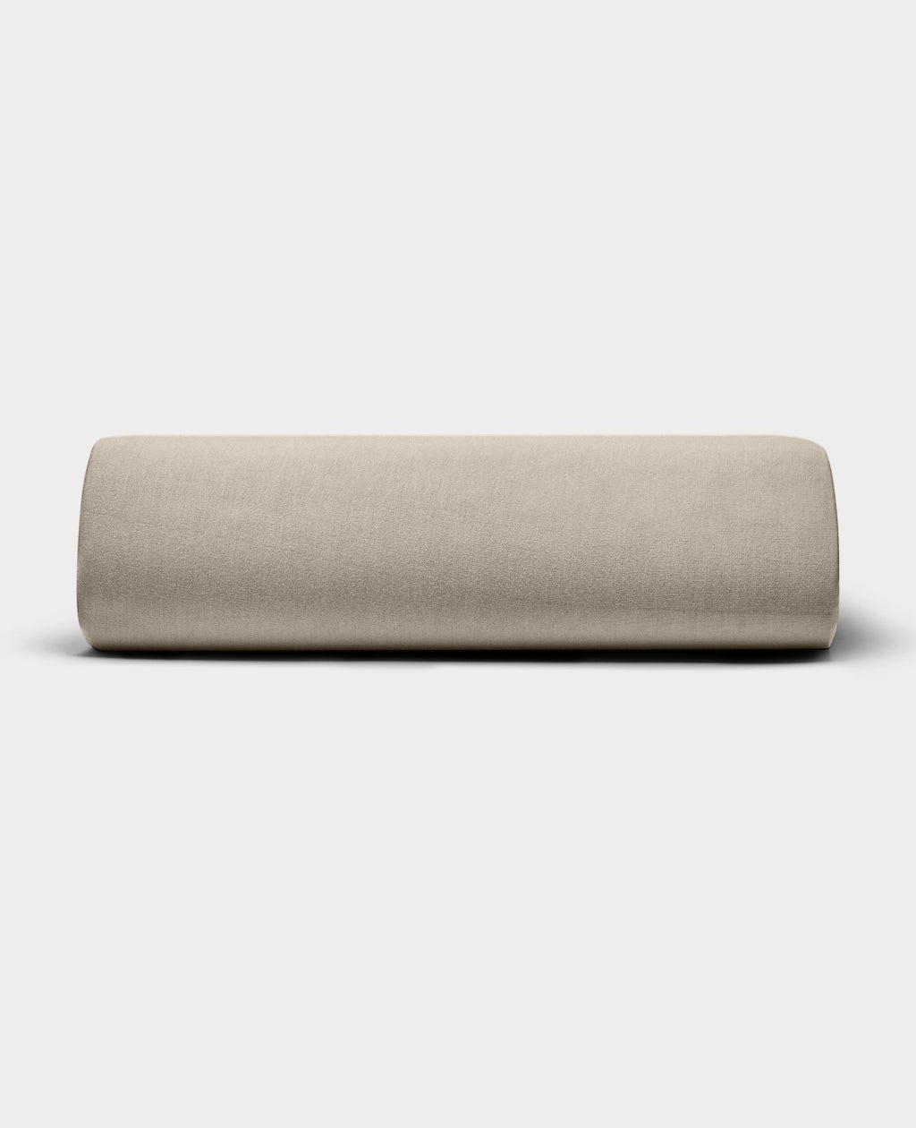 The Bamboo Jersey Fitted Sheet by Cozy Earth, shown in light beige with a smooth fabric texture, is displayed against a plain white background.|Color:Driftwood