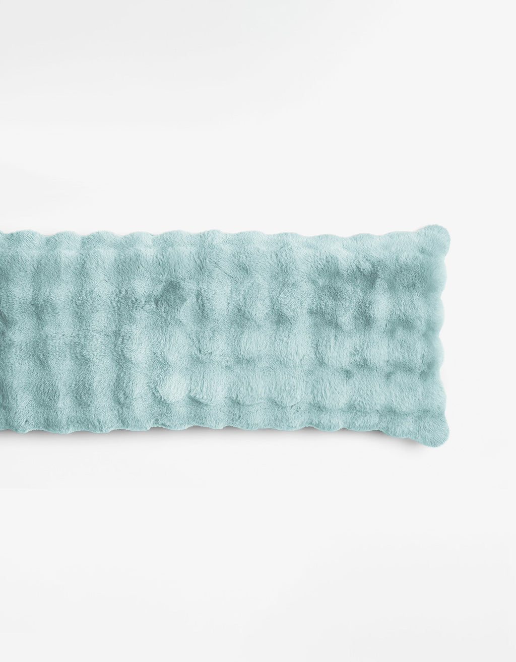 The Bubble Cuddle Pillow by Cozy Earth is a rectangular, blue-colored plush pad with a soft, furry texture, shown lying flat on a plain white background.|Color:Tide |Size:Body - 20" x 54"