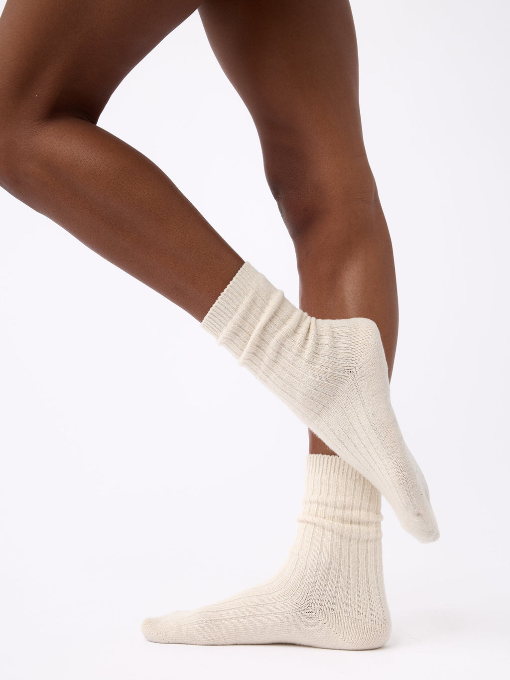 Person wearing Cozy Earth Plush Lounge Calf Sock 1-Pack in Alabaster |Color:Alabaster
