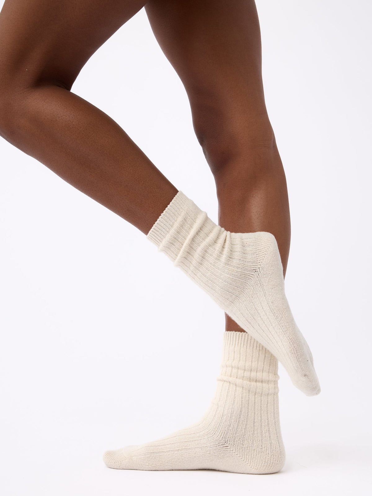 Person wearing Cozy Earth Plush Lounge Calf Sock 1-Pack in Alabaster |Color:Alabaster