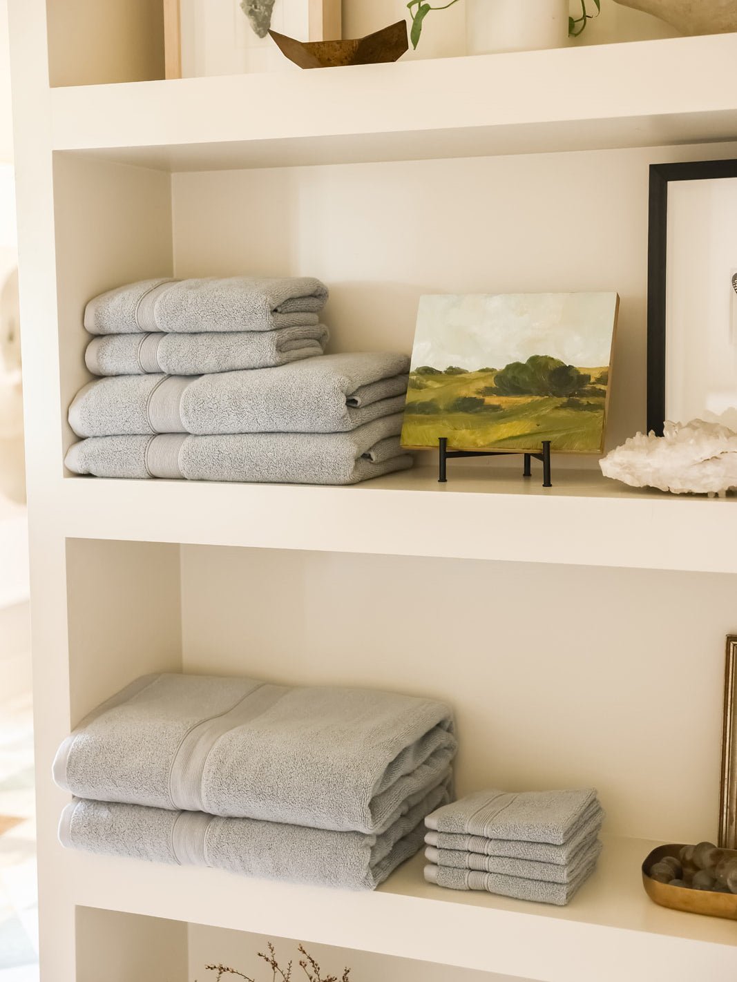 Collection of harbor mist luxe towels on shelves |Color:Harbor Mist