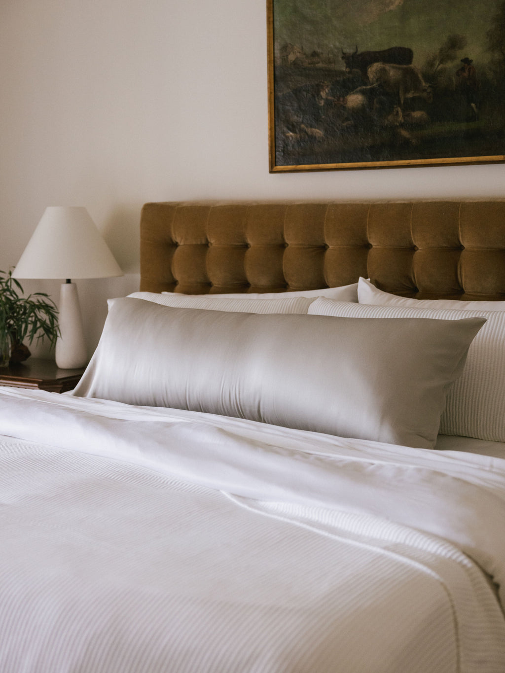 Body pillow with light grey case on bed |Color:Light Grey