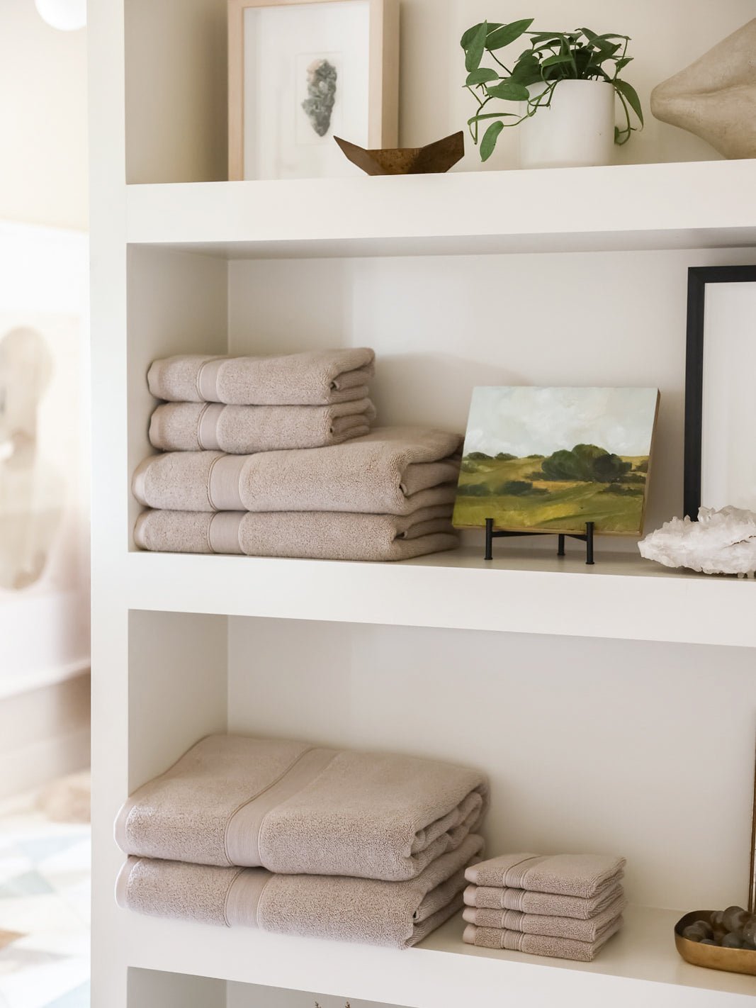 Complete luxe bath bundle folded on shelves |Color:Sand