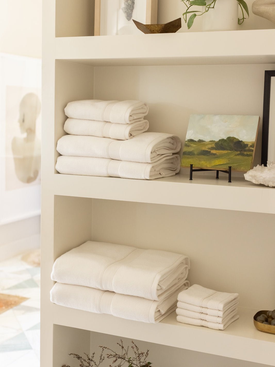 Complete luxe bath bundle folded on shelves |Color:Seashell
