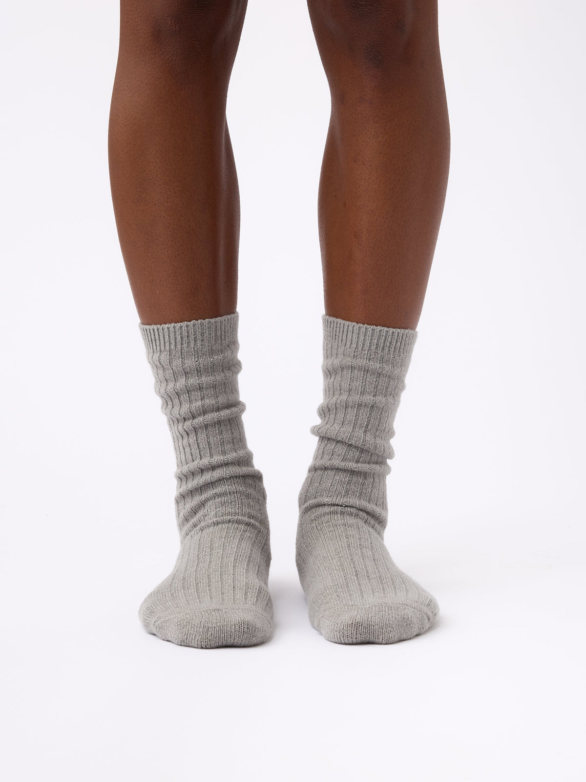 Person wearing Cozy Earth Plush Lounge Calf Sock 1-Pack in Stone |Color:Stone