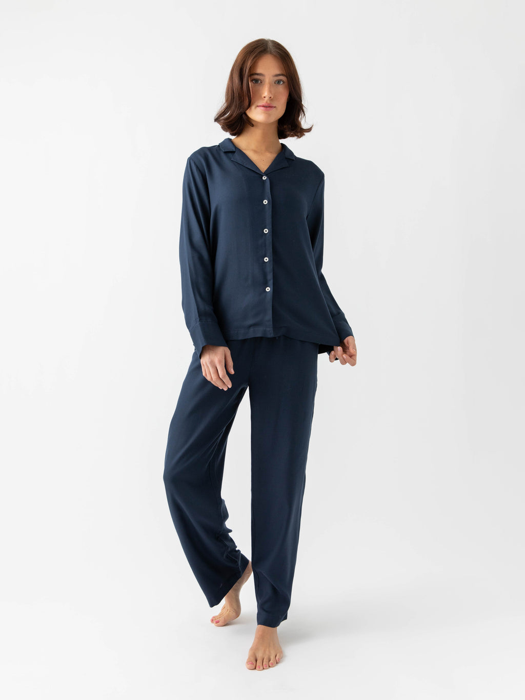 Woman wearing Eclipse soft woven pajamas with white background |Color:Eclipse