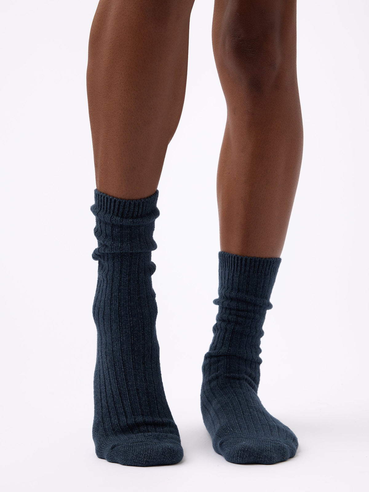 Person wearing Cozy Earth Plush Lounge Calf Sock in Eclipse 
|Color:Eclipse/Deep Blue/Smokey Blue