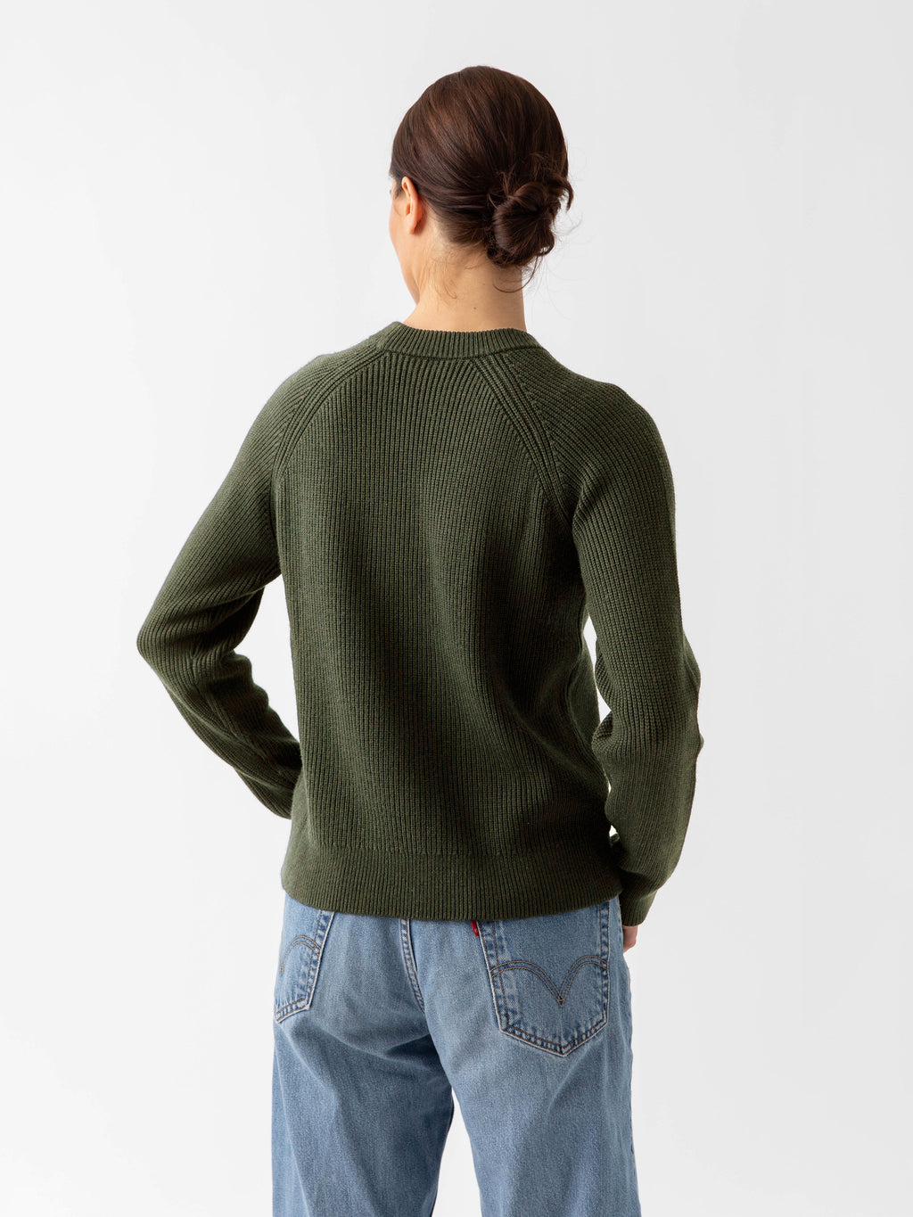 Back of woman wearing juniper classic crewneck and jeans with white background |Color:Juniper