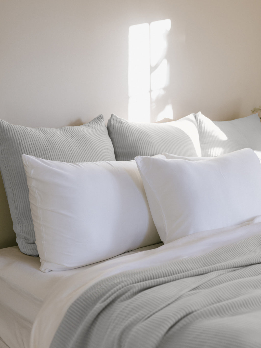 Light Grey euro coverlet shams behind white pillows on bed |Color:Light Grey