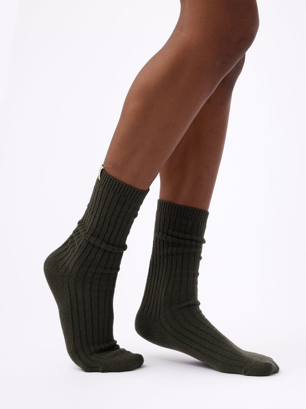 Person wearing Cozy Earth Plush Lounge Calf Sock in Pine |Color:Pine/Olive/Juniper