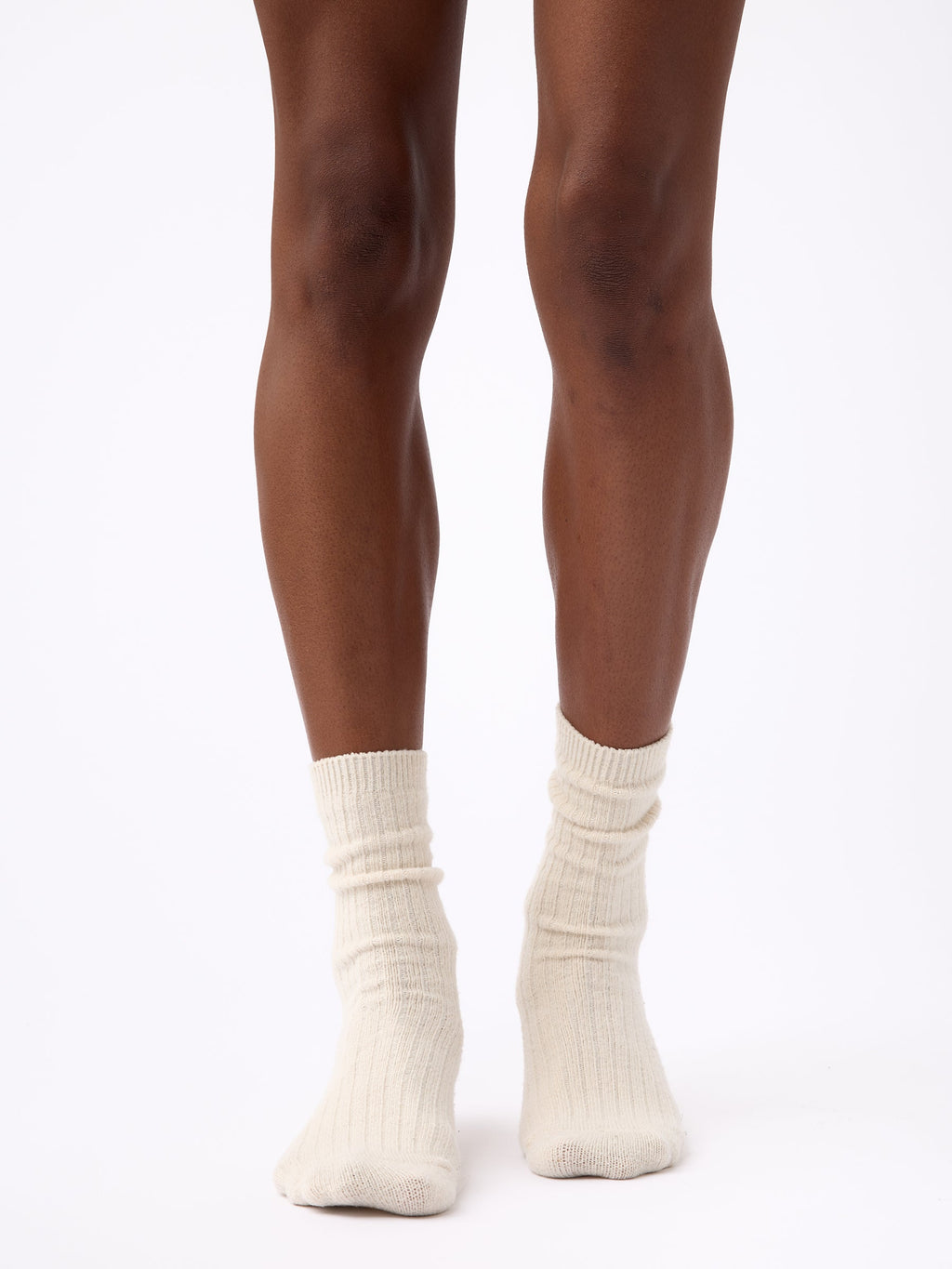 Person wearing Cozy Earth Plush Lounge Calf Sock 1-Pack in Alabaster |Color:Alabaster