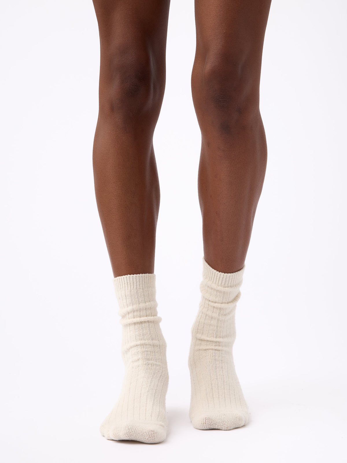Person wearing Cozy Earth Plush Lounge Calf Sock 1-Pack in Alabaster |Color:Alabaster