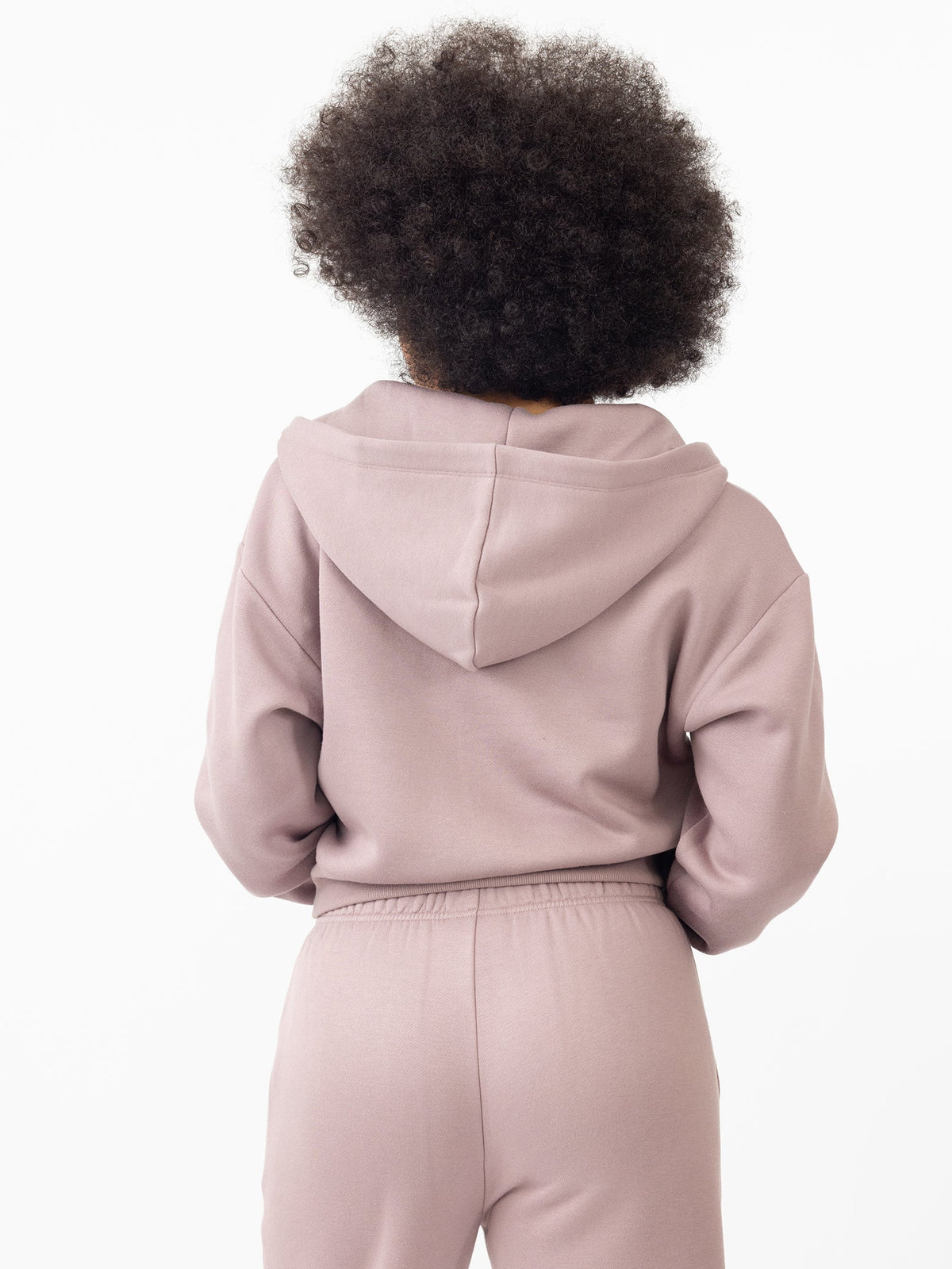Woman wearing Dusty Orchid CityScape Cropped Full Zip with white background |Color: Dusty Orchid