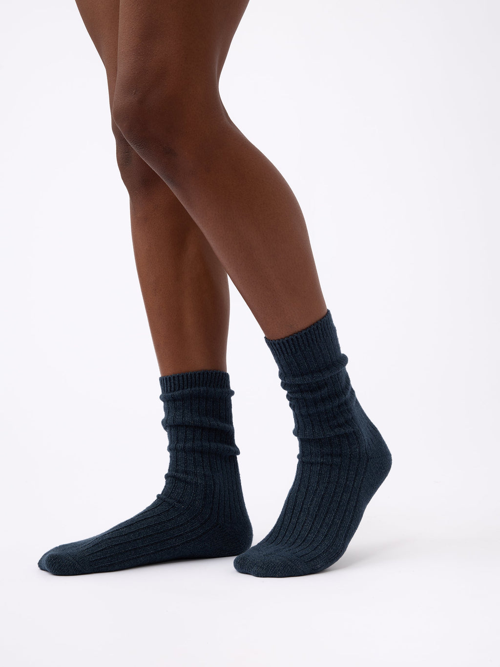 Person wearing Cozy Earth Plush Lounge Calf Sock in Eclipse |Color:Eclipse/Deep Blue/Smokey Blue