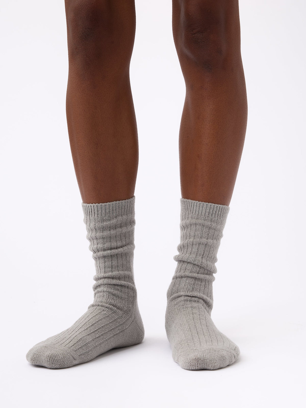 Person wearing Cozy Earth Plush Lounge Calf Sock 1-Pack in Stone |Color:Stone