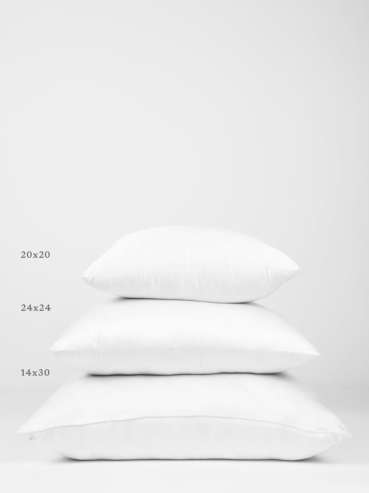 Comparison of different down alternative inserts with white background |Size:24" x 24"
