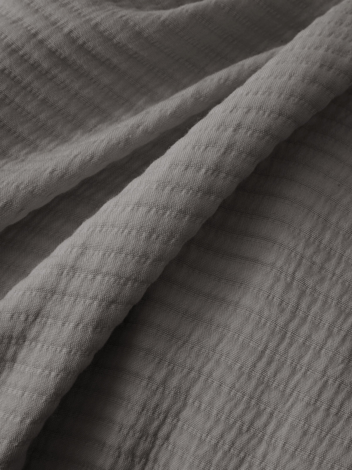 Close up of charcoal coverlet fabric |Color:Charcoal