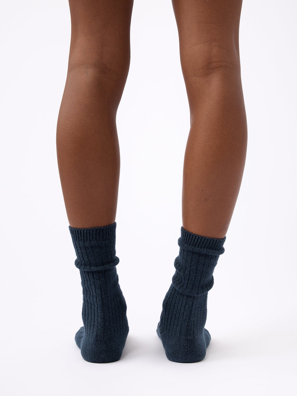 Person wearing Cozy Earth Plush Lounge Calf Sock in Eclipse |Color:Eclipse/Deep Blue/Smokey Blue
