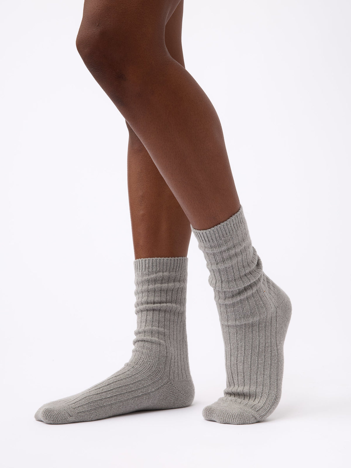Woman wearing Cozy Earth Plush Lounge Calf Sock 1-Pack in Stone |Color:Stone