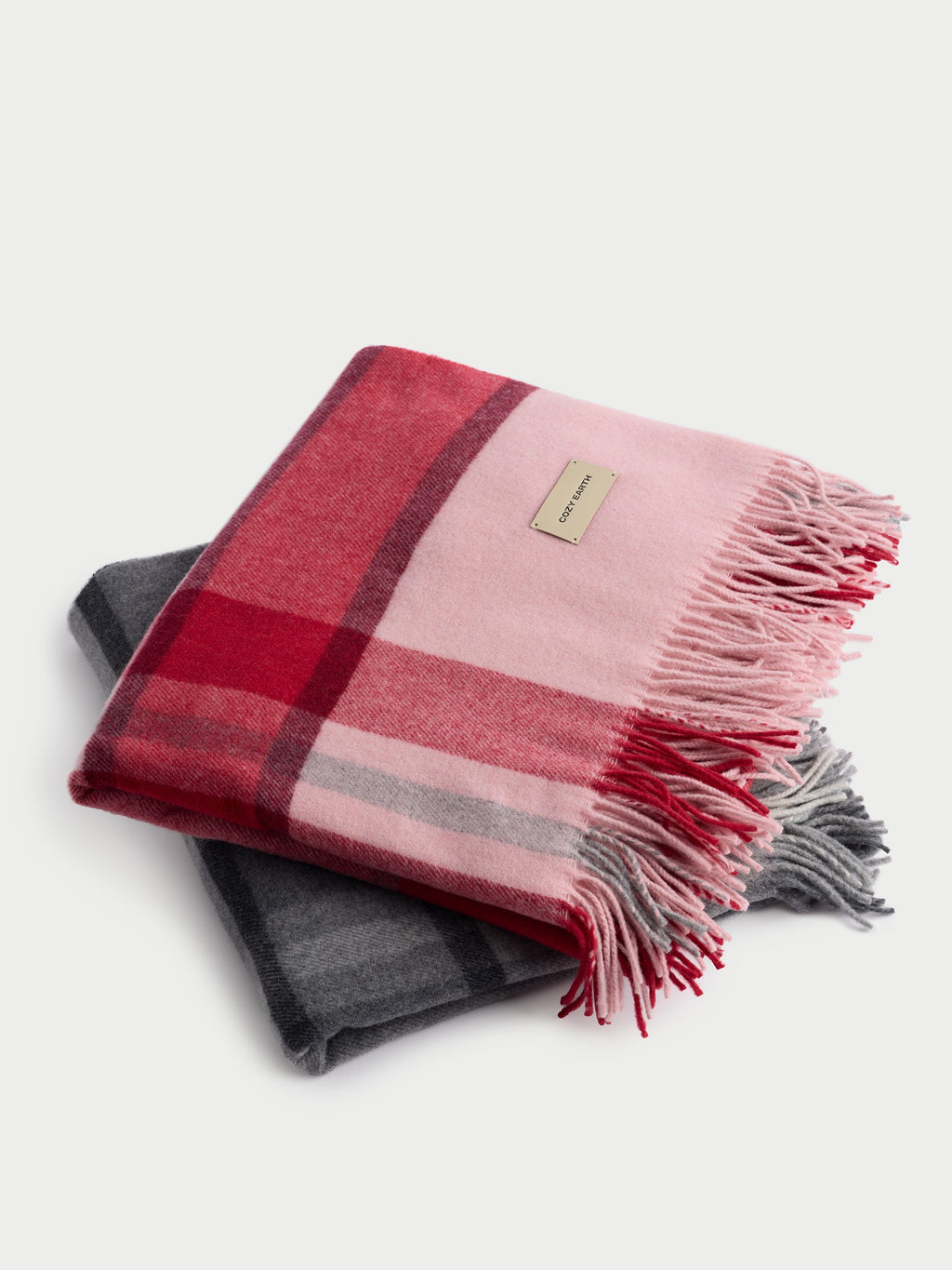 Pink and grey lucca throws folded with white background |Color:Pink