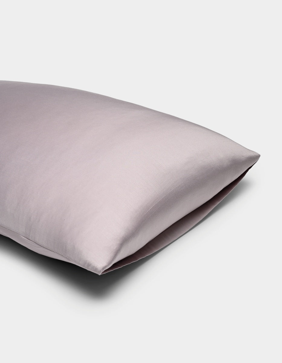 A light purple Cozy Earth Bamboo Pillowcase with a smooth, soft fabric cover, shown on a white background.|Color:Lavender